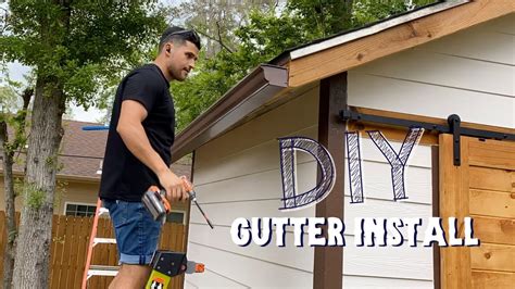 installing gutters on a shed